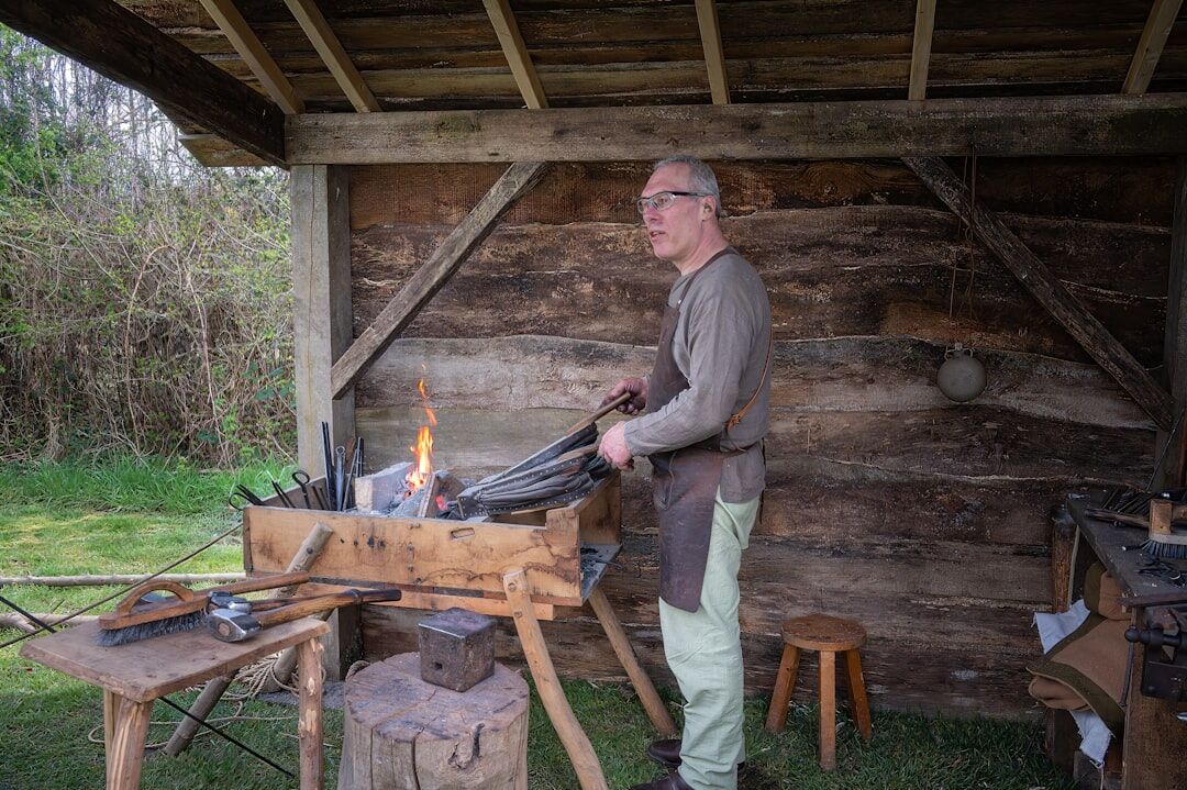 blacksmith at forge